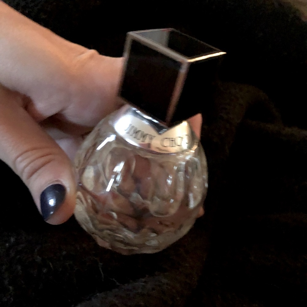 1.3 FLOZ Jimmy Choo Perfume. Barely used. Shown in the pictures.